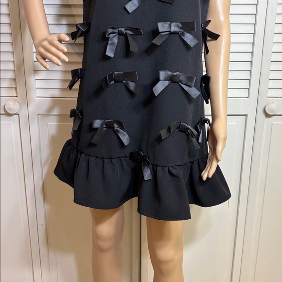 Sister Jane bow embellished mini pinafore dress in black Medium - Picture 7 of 16